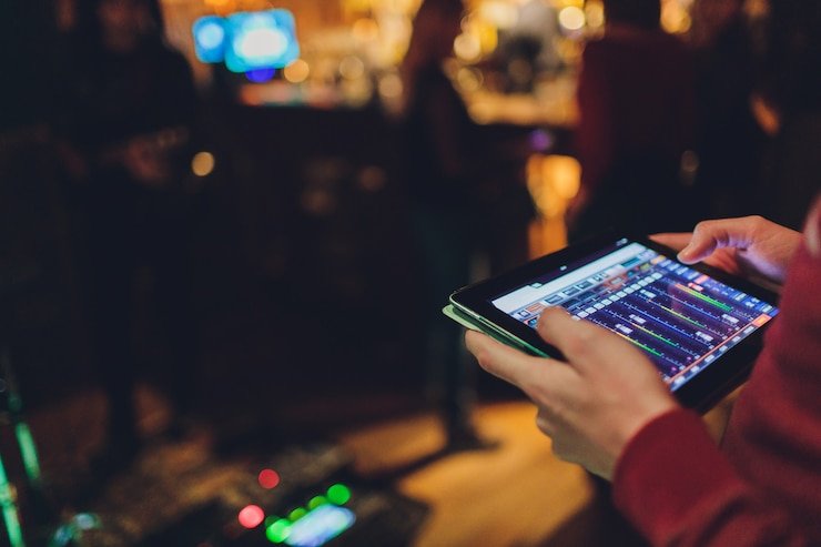 Antarmuka aplikasi mobile dewi 188 menampilkan meja Three Card Poker dengan dealer langsung dan panel taruhan